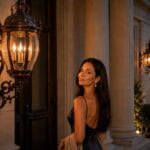 The Hinkley San Clemente Wall Lantern: Solid Brass Built to Anchor an Estate Entrance Hinkley San Clemente three-light large outdoor wall mount lantern in copper bronze with clear beveled glass beside a front entry