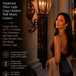 Hinkley San Clemente three-light large outdoor wall mount lantern in copper bronze with clear beveled glass beside a front entry