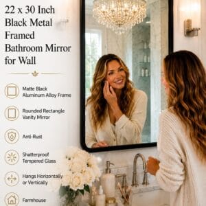 LOAAO 22 x 30 inch matte black metal framed rounded rectangle bathroom vanity mirror mounted above a sink