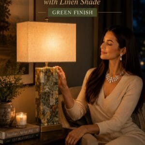 Creative Co-Op marbled green resin studded table lamp with natural linen drum shade styled on a modern console table