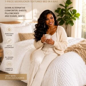 7-piece white seersucker textured queen comforter set with down alternative comforter, sheets, pillowcases, and shams styled on a modern bed
