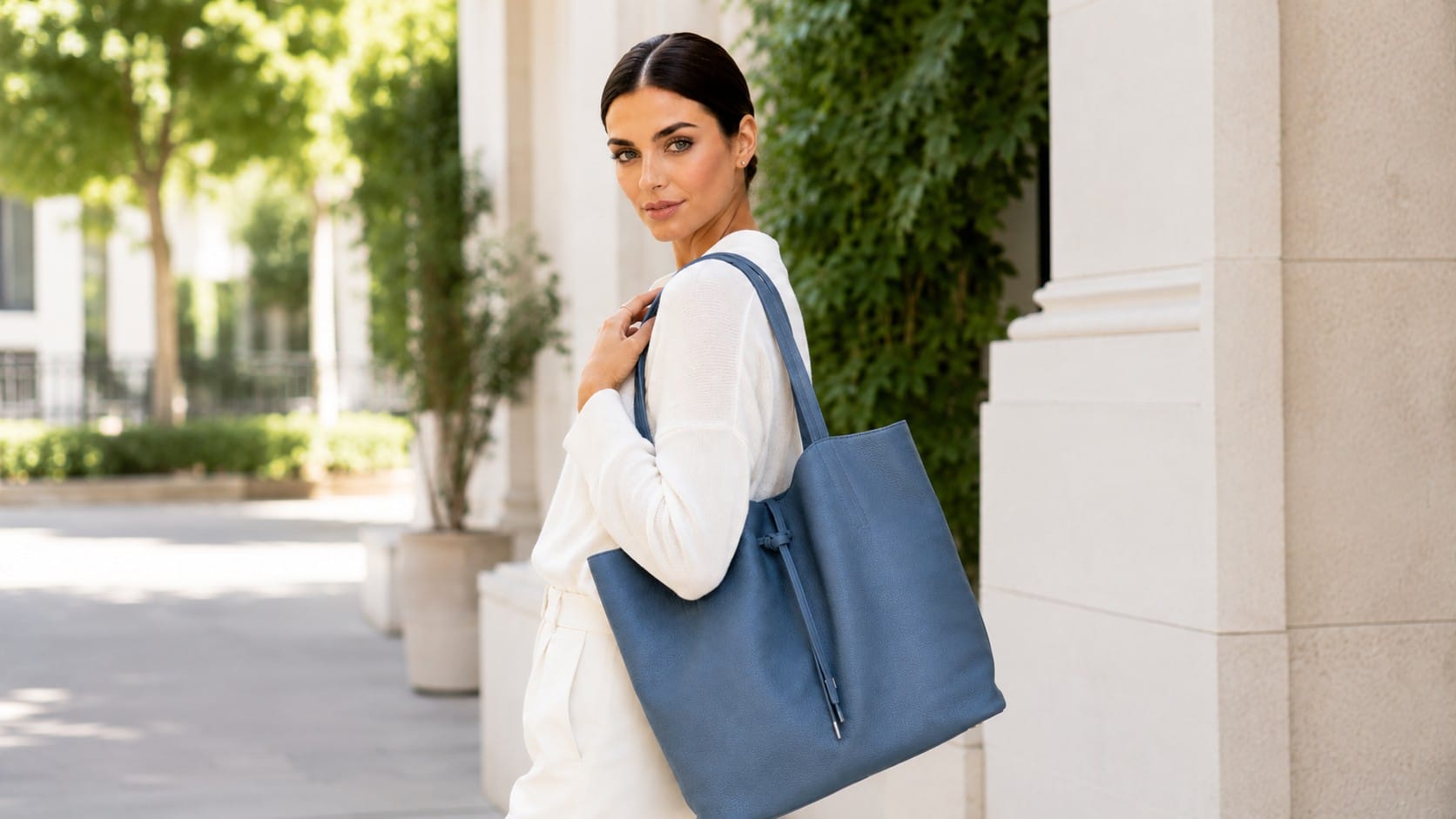 The Unlined Italian Leather Tote: Why a Bag With Nothing to Hide Is the One to Buy Genuine Italian leather slouchy tote bag in denim blue with a raw unlined interior and top zipper