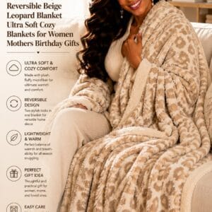 Snuggle Sac reversible beige leopard print knit throw blanket draped over a couch