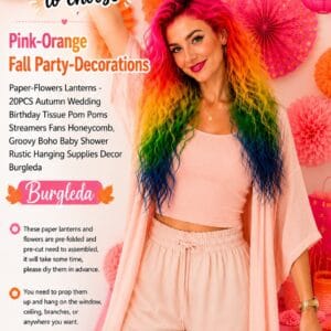 Burgleda pink and orange fall party decorations with paper flowers, lanterns, fans, and honeycomb balls as a backdrop