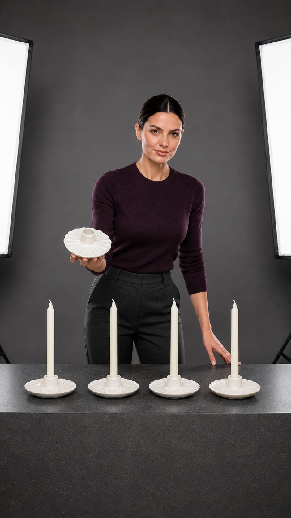 Nikki presenting matte ceramic taper candle holders