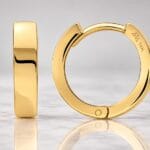 art and molly 14k gold huggie hoops hero